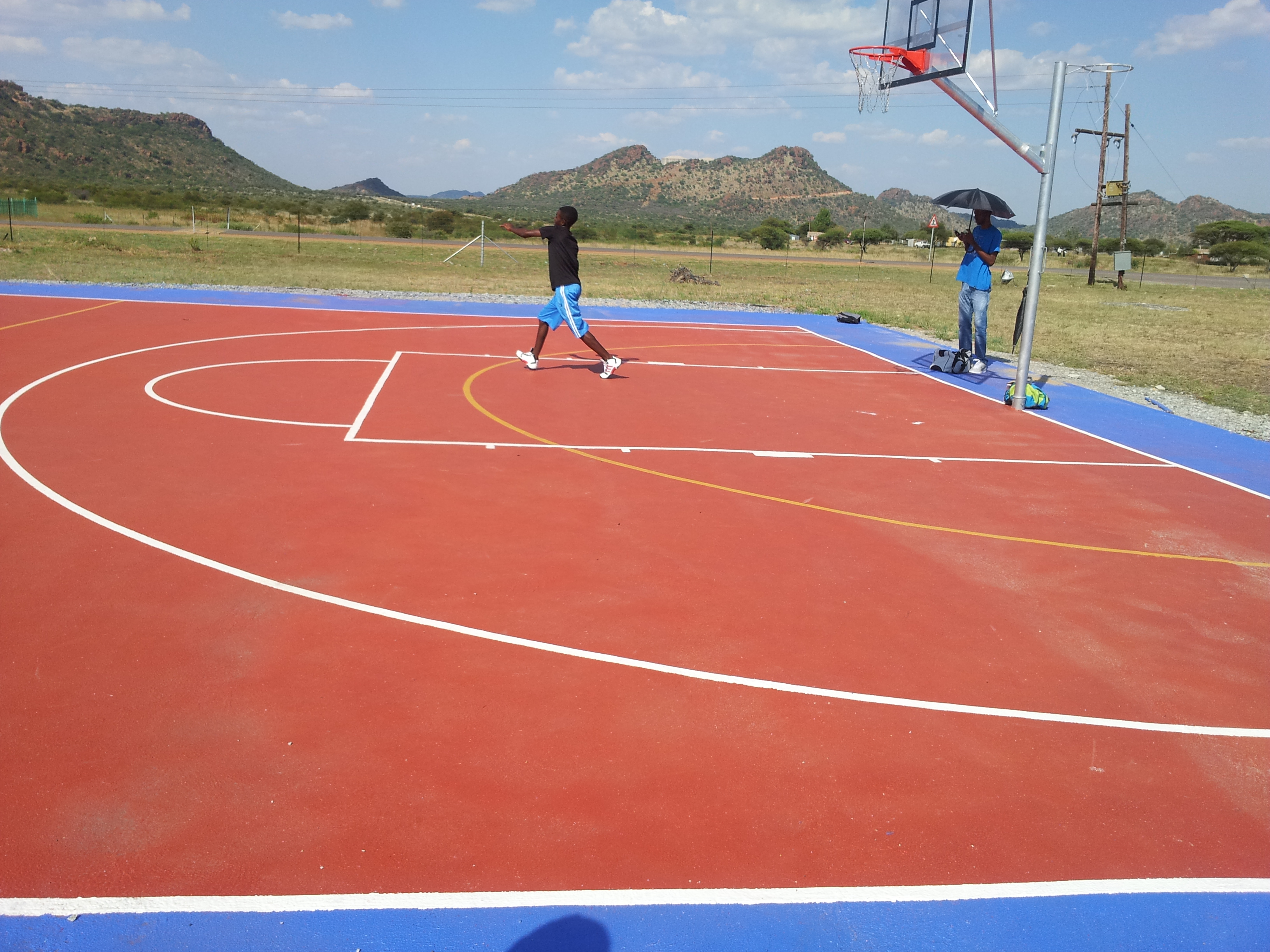 Basketball courts prior to repairs 